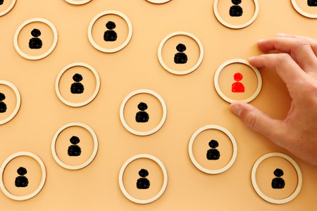 business concept image of people figures over wooden table, human resources and management conceptの写真素材