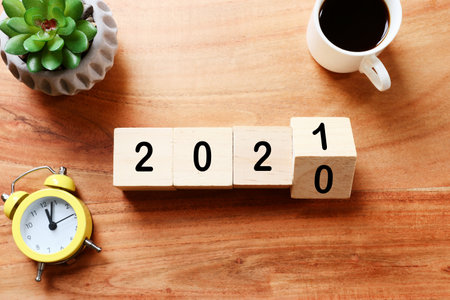 New year 2021 concept. business idea over wooden board