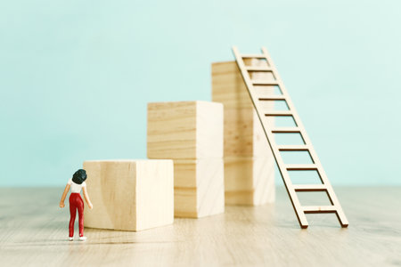 business concept picture of challenge. woman stands on the edge of a high wall and passes the gap by...