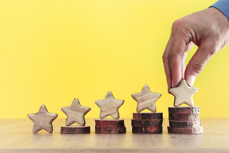 concept image of setting a five star goal. increase rating or ranking, evaluation and classification ideaの写真素材