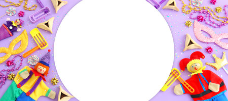 Purim celebration concept (jewish carnival holiday) over wooden purple background. Top view, flat layの写真素材