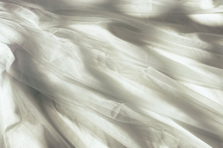 Vintage white tulle chiffon texture background with shadowsの写真素材