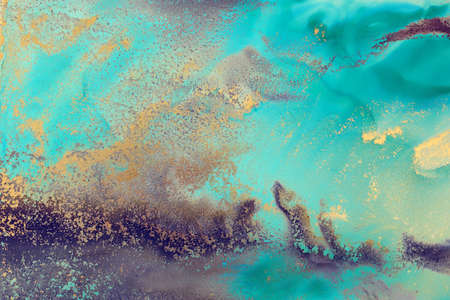 art photography of abstract fluid art painting with alcohol ink, blue, turquoise and gold colors