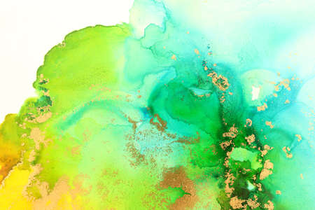 art photography of abstract fluid art painting with alcohol ink, ocean colors, green, turquoise, blue and goldの写真素材