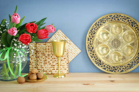 Pesah celebration concept (jewish Passover holiday). Traditional pesah plate text in hebrew:...