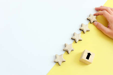 concept image of setting a five star goal. increase rating or ranking, evaluation and classification ideaの写真素材