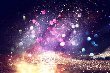 purple, black and pink glitter vintage lights background. defocusedの写真素材