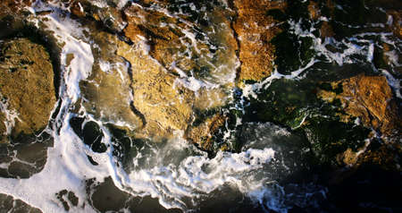 abstract background of waves of water creating swirls and ripples