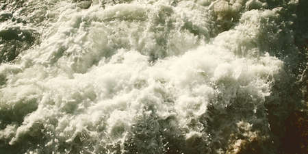 abstract background of waves of water creating swirls and ripples
