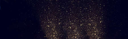 background of abstract gold and black glitter lights. defocused