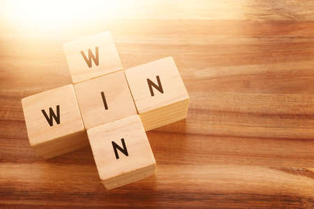 Wooden cubes stack with the text win-win-situation. Strategy and business conceptの写真素材