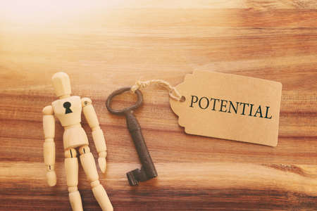 unlock your potential concept. vintage key with tagの写真素材