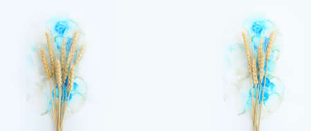 Creative image of beautiful wheat crops on artistic ink background. Top view with copy space. Symbols of jewish holiday - Shavuotの写真素材