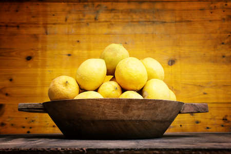 Image of group of fresh lemons over old vintage wooden tableの写真素材