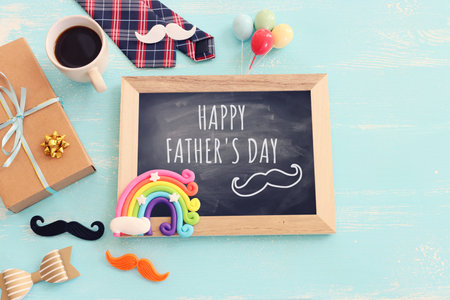 top view image of fathers day composition with vintage father's accessories and blackboardの写真素材