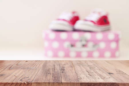 empty table board and defocused indoor background. product display concept