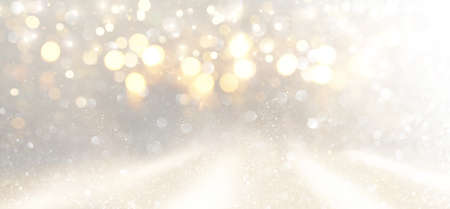 abstract glitter silver and gild lights background. de-focusedの写真素材