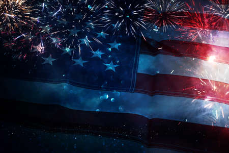 American flag with glitter bokeh background and fireworksの写真素材