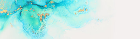 art photography of abstract fluid painting with alcohol ink, blue and gold colorsの写真素材