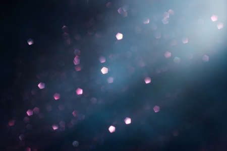 background of abstract purple, silver and black glitter lights. defocused