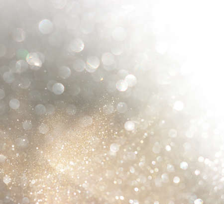 abstract glitter silver and gild lights background. de-focusedの写真素材