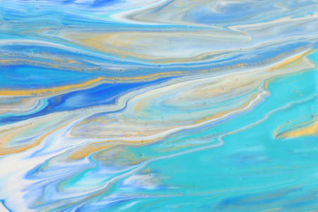 art photography of abstract marbleized effect background. Blue, mint and gold creative colors....