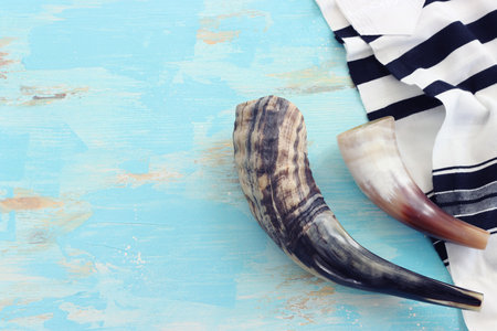 religion image of shofar (horn) on white prayer talit. Rosh hashanah (jewish New Year holiday), Shabbat and Yom kippur conceptの写真素材