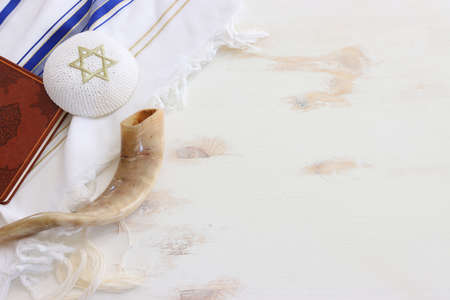 religion image of shofar (horn) on white prayer talit. Rosh hashanah (jewish New Year holiday), Shabbat and Yom kippur conceptの写真素材