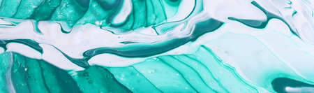 art photography of abstract marbleized effect background with white and green creative colors. Beautiful paint.の写真素材