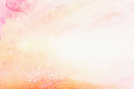 painted textured image of pink and gold colorsの写真素材