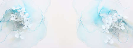 Creative image of pastel blue Hydrangea flowers on artistic ink background. Top view with copy space
