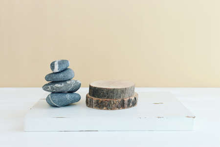 product display concept. minimal scene with wooden shapes on beige background