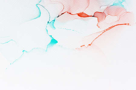 art photography of abstract fluid painting with alcohol ink, red and green blue colors. Paper textureの写真素材