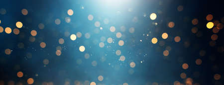 background of abstract glitter lights. gold, blue and black. de focusedの写真素材