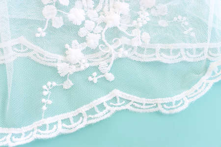 Background of white delicate lace fabricの写真素材