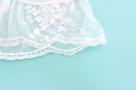 Background of white delicate lace fabric