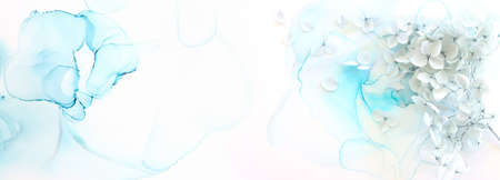 Creative image of pastel blue Hydrangea flowers on artistic ink background. Top view with copy space