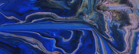 art photography of abstract marbleized effect background with black and blue creative colors....