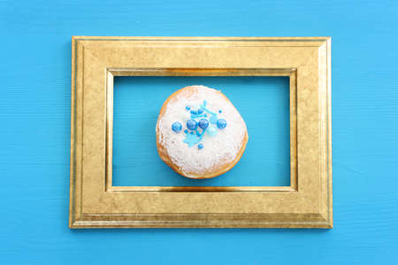 Image of jewish holiday Hanukkah with doughnutの写真素材