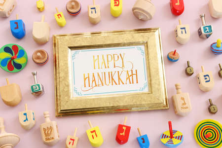 Image of jewish holiday Hanukkah with wooden dreidels collection (spinning top)の写真素材