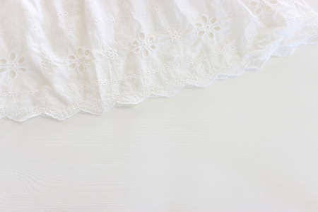 Background of white embroidered delicate lace fabricの写真素材