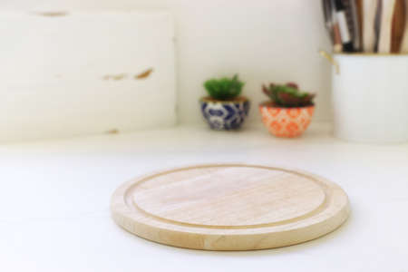 empty table board and defocused modern kitchen background. product display conceptの写真素材