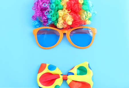 carnival, party and Purim celebration concept (jewish carnival holiday) over blue backgroundの写真素材