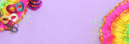 Holidays image of mardi gras masquarade masks over purple background. view from aboveの写真素材