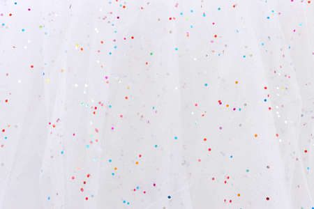 Vintage white tulle chiffon with sparkle glitter texture background. wedding concept