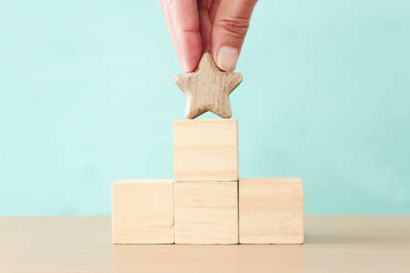 concept image of setting a five star goal. increase rating or ranking, evaluation and classification ideaの写真素材