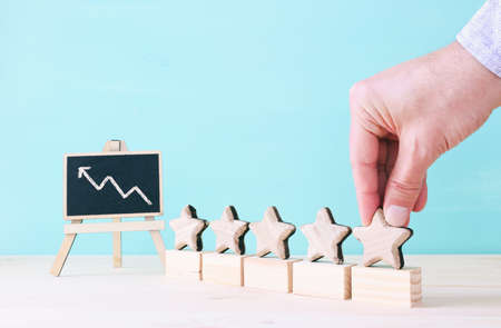 concept image of setting a five star goal. increase rating or ranking, evaluation and classification ideaの写真素材