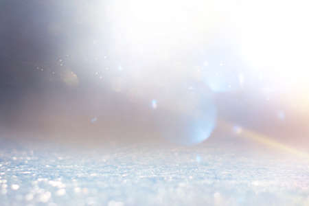 background of abstract gold and silver glitter lights. defocusedの写真素材