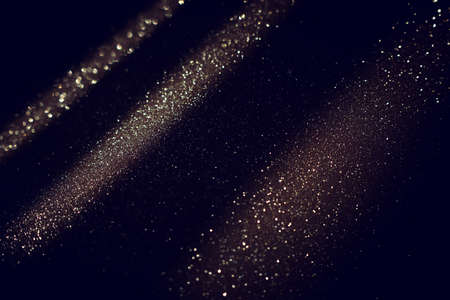 background of abstract glitter lights. gold and black. de focusedの写真素材