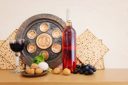 Pesah celebration concept (jewish Passover holiday). Translation of Traditional pesakh plate text:...